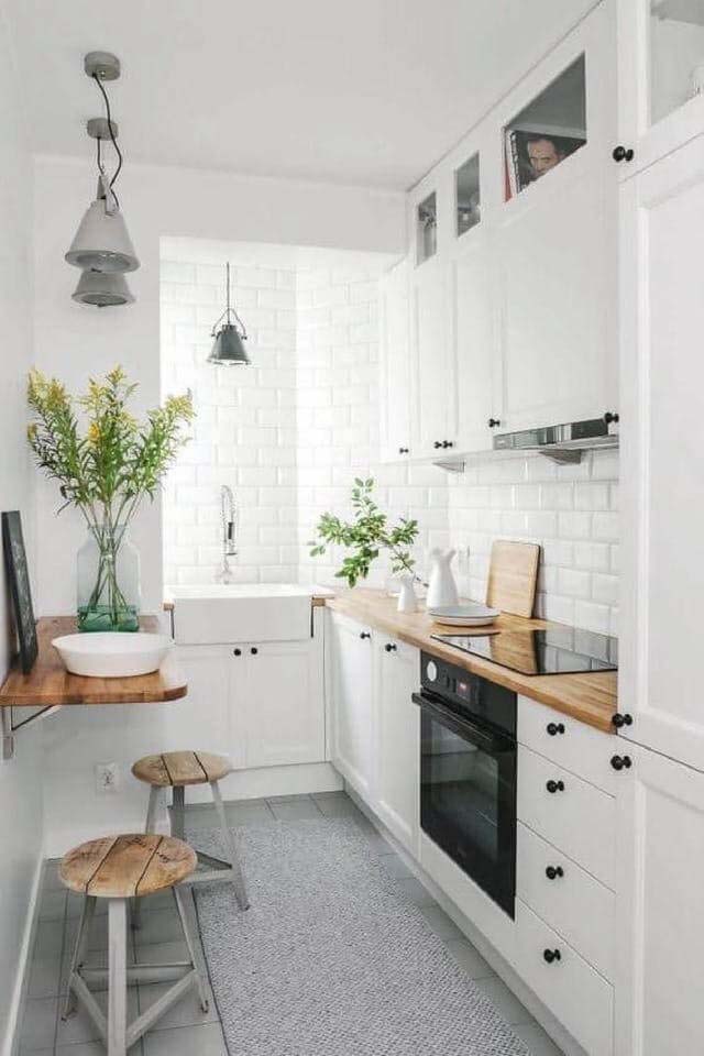 Natural Light and White Brightens Narrow Space #small #kitchen #design #decorhomeideas