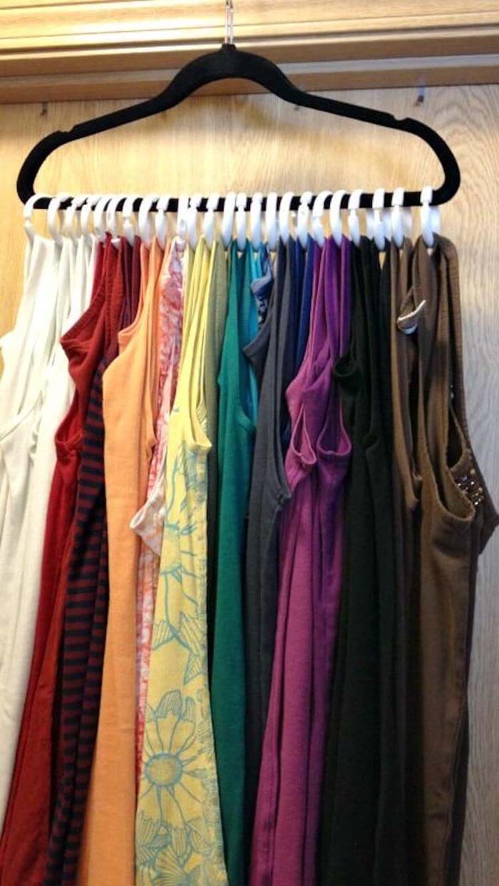 A Rainbow of Tanks on One Hanger #dollarstore #storage #organization #decorhomeideas