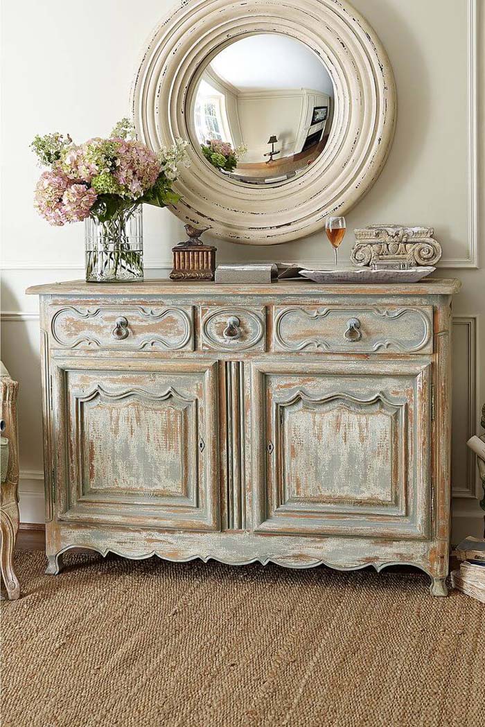 Antiqued Credenza and Rustic Round Mirror #frenchcountry #decor #decorhomeideas