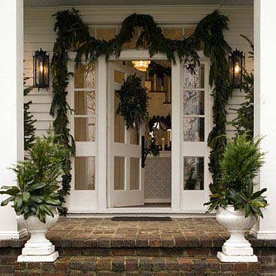 Greenery-Filled Christmas Urns #Christmas #urns #decorations #decorhomeideas