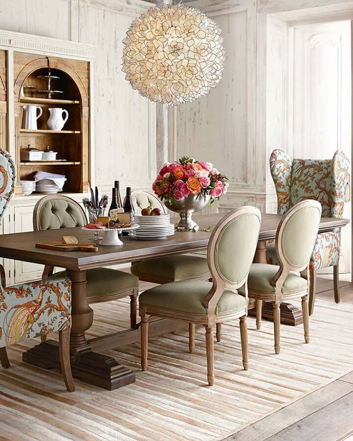 High-Ceilinged Dining Room with Fanciful Chairs #frenchcountry #decor #decorhomeideas