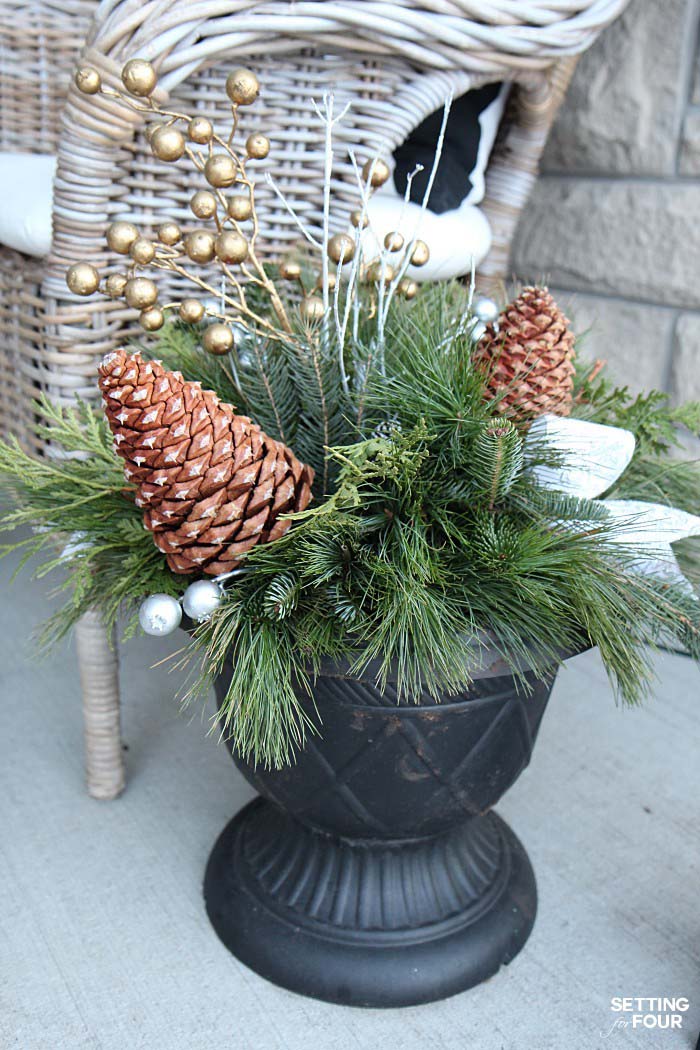 Pine Cones and Golden Berries in a Vintage Planter #Christmas #urns #decorations #decorhomeideas