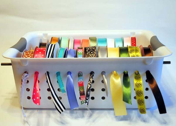 Hang Ribbon In A Slotted Tupperware Bin #Christmas #storage #organization #decorhomeideas