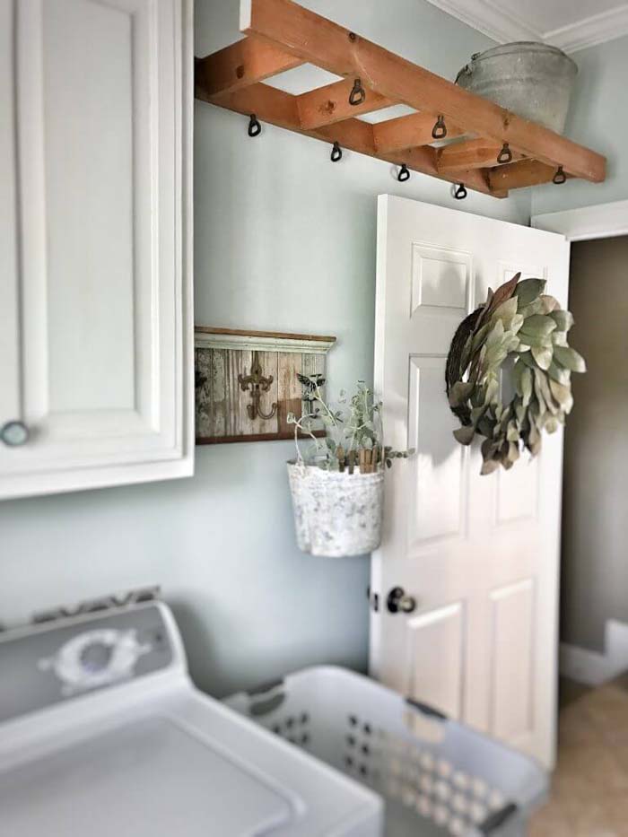 Ladder Shelf Makes Amazing Indoor Clothes Line #masonjarlights #masonjar #decorhomeideas