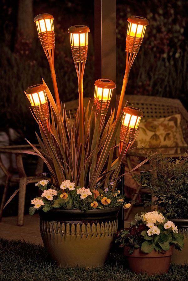 Level up your Tiki-torch Game with Creative Placement #lighting #yard #outdoor #decorhomeideas