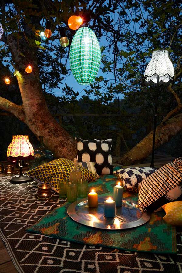 Pair Ethnic Fabrics with Soft Lantern Lighting #lighting #yard #outdoor #decorhomeideas