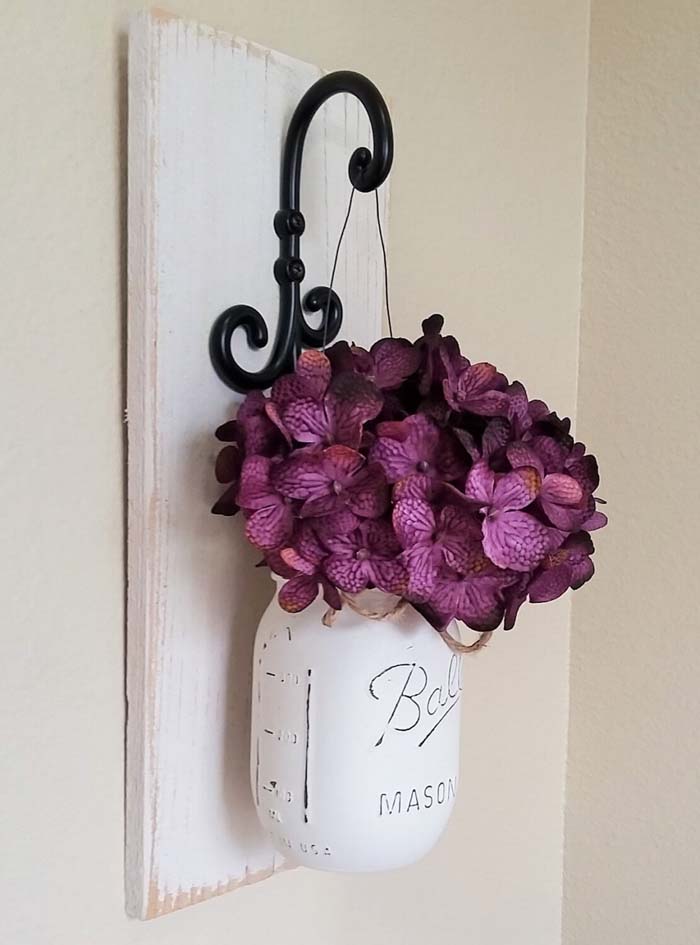 Purple Flower Whitewashed Mason Jar Wall Decor #masonjarlights #masonjar #decorhomeideas