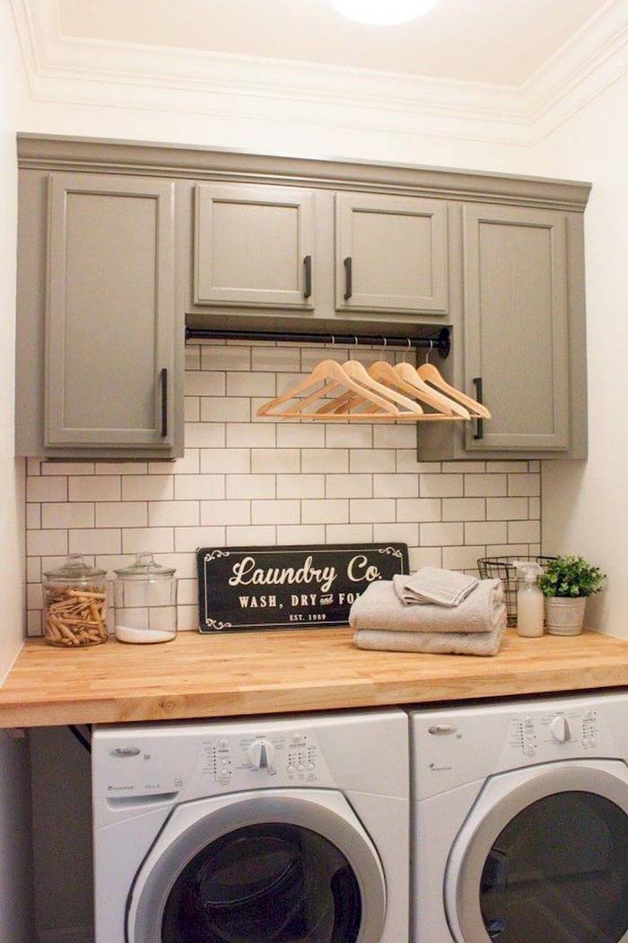 Tile Backsplash over the Washer and Dryer #masonjarlights #masonjar #decorhomeideas