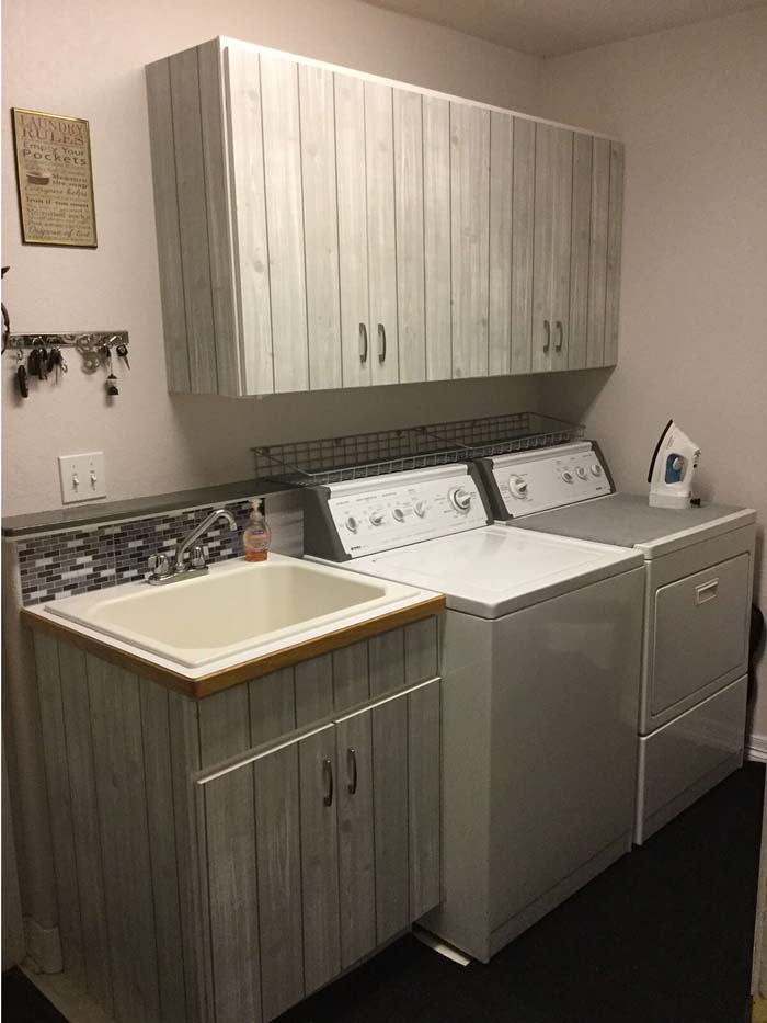 White Washed Grey Laundry Cabinets #masonjarlights #masonjar #decorhomeideas