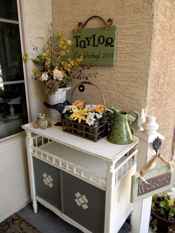 Antiqued Outdoor Hutch With Tawny Floral Bouquets #rustic #springdecor #porch #decorhomeideas