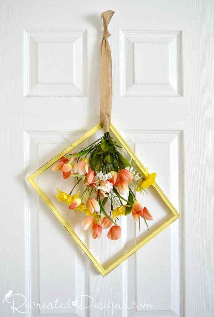 DIY Repurposed Frame with Spring Flowers #springwreath #diy #decorhomeideas