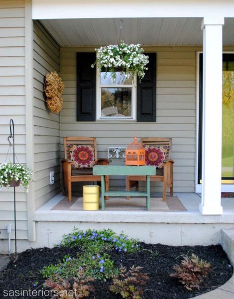 Wooden Chairs and Table With Colorful Pillows #rustic #springdecor #porch #decorhomeideas