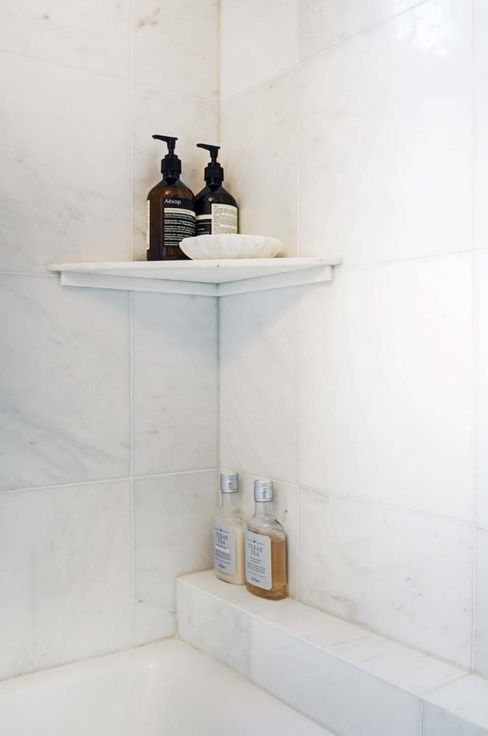 Retrofitted Corner Shelves And A Bathtub Ledge