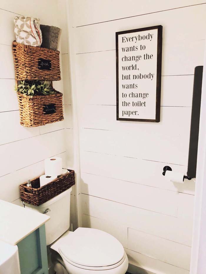 Storage Galore with Woven Baskets and Fun Bathroom Sign #bathroom #decor #decorhomeideas