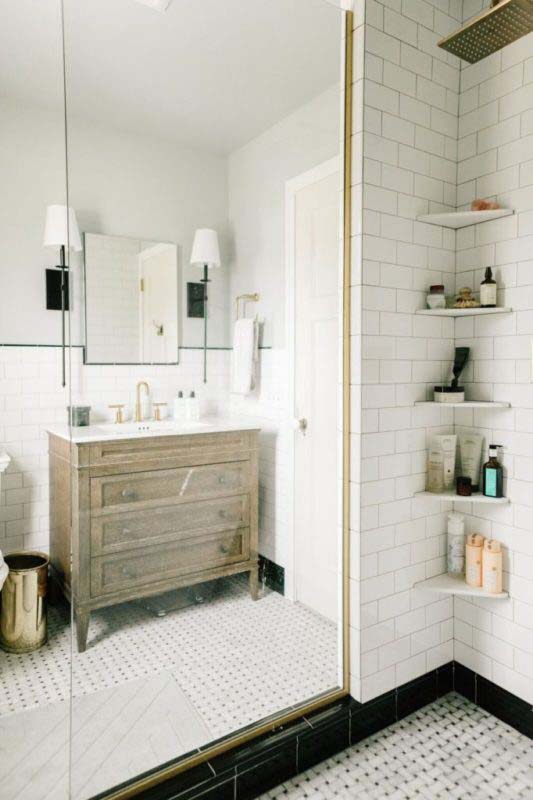 Tiny Corner Shelves Maximize A Glass Front Shower