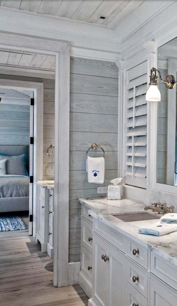 A Wood-Inspired Bathroom with Bronze Fixtures #beachhouse #interiordesign #decorhomeideas