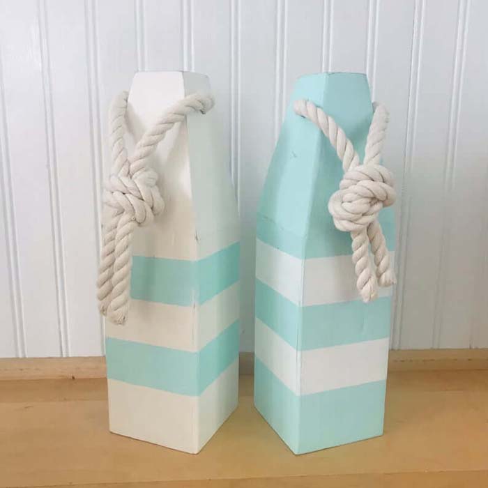 Mint Green and White Wooden Buoys #nauticalbathroom #bathdecor #decorhomeideas