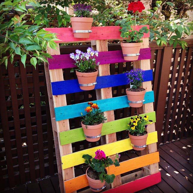 Painted Rainbow Recycled Pallet Planter #gardencontainer #garden #planter #decorhomeideas
