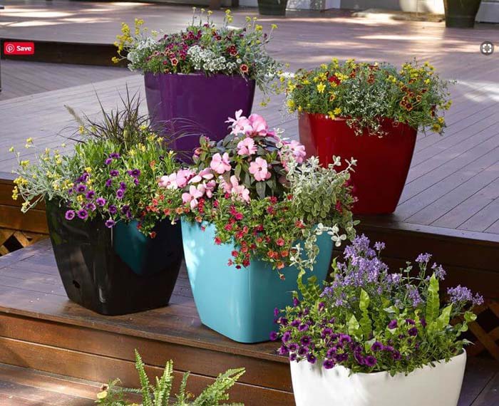 Pops of Color: Overflowing Planters #gardencontainer #garden #planter #decorhomeideas