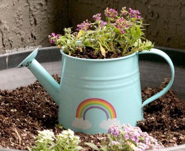 Turquoise Watering Can Flower Container #gardencontainer #garden #planter #decorhomeideas