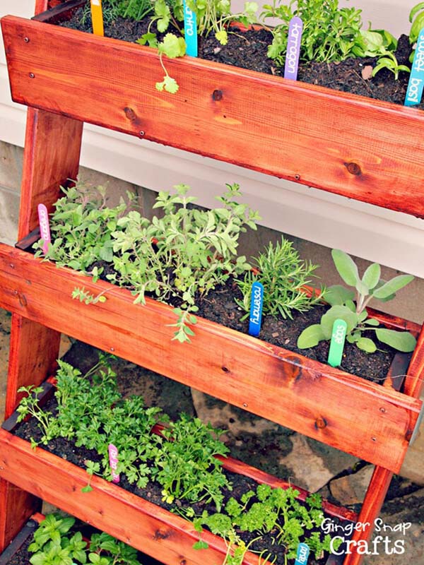 Vertical Herb Garden Using Stained Cedar Troughs #gardencontainer #garden #planter #decorhomeideas