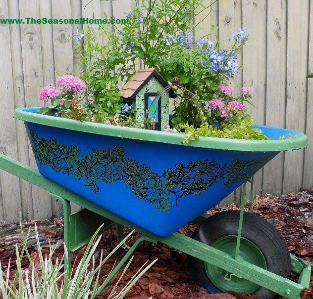 Whimsical Broken Wheelbarrow Fairy Garden #gardencontainer #garden #planter #decorhomeideas
