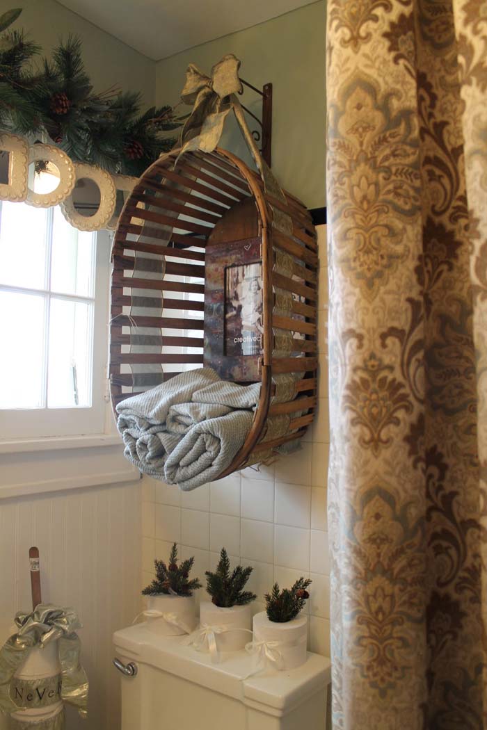 Antique Basket Converted to Hanging Storage #rusticbathroom #rusticdecor #decorhomeideas