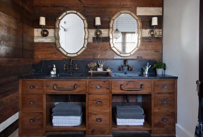 Dark Paneled Vanity Backsplash with Vintage-style Double Mirrors #rusticbathroom #rusticdecor #decorhomeideas