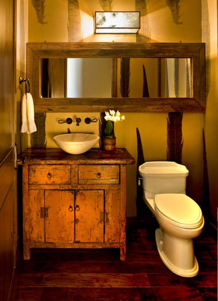 Distressed Vanity Cabinet and Wood-framed Mirror #rusticbathroom #rusticdecor #decorhomeideas