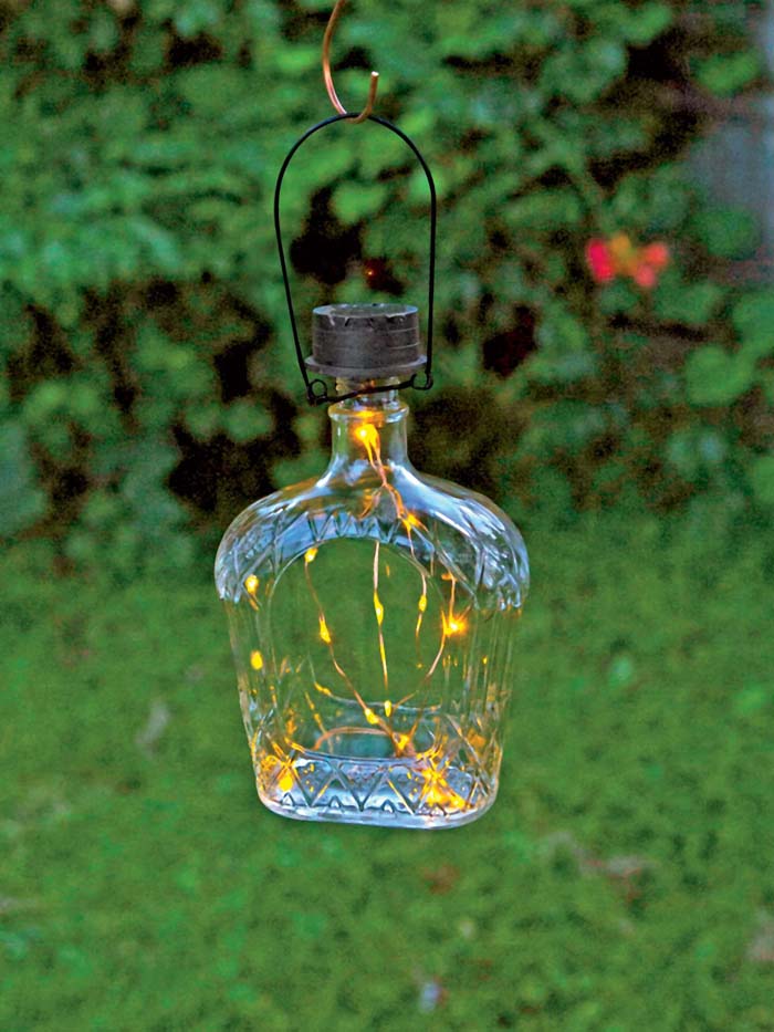 Fairy Lights in a Decorative Bottle #gardenlantern #diylanterns #decorhomeideas