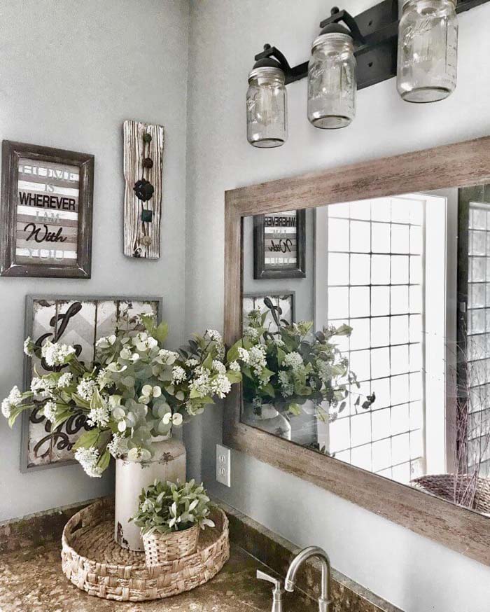 Mason Jar Lights and Rustic Wooden Features #rusticbathroom #rusticdecor #decorhomeideas