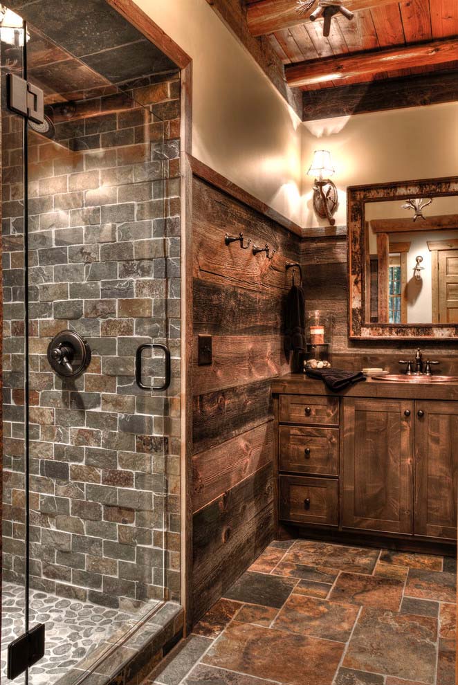 Stone Lodge Bathroom Featuring a Camo-edged Mirror #rusticbathroom #rusticdecor #decorhomeideas