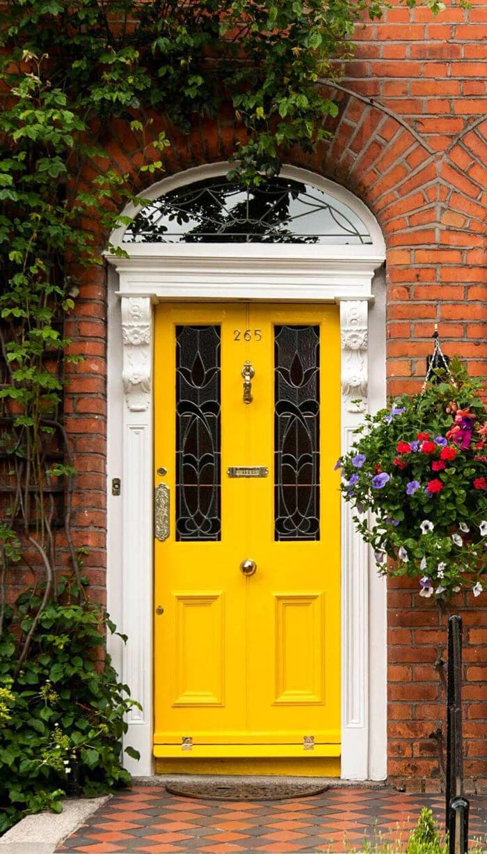 Sunshine Yellow Door on a Cloudy Day #frontdoorcolor #frontdoor #paintcolor #decorhomeideas