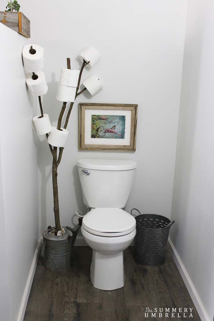 Toilet Paper Tree and Watering Can Decoration #rusticbathroom #rusticdecor #decorhomeideas