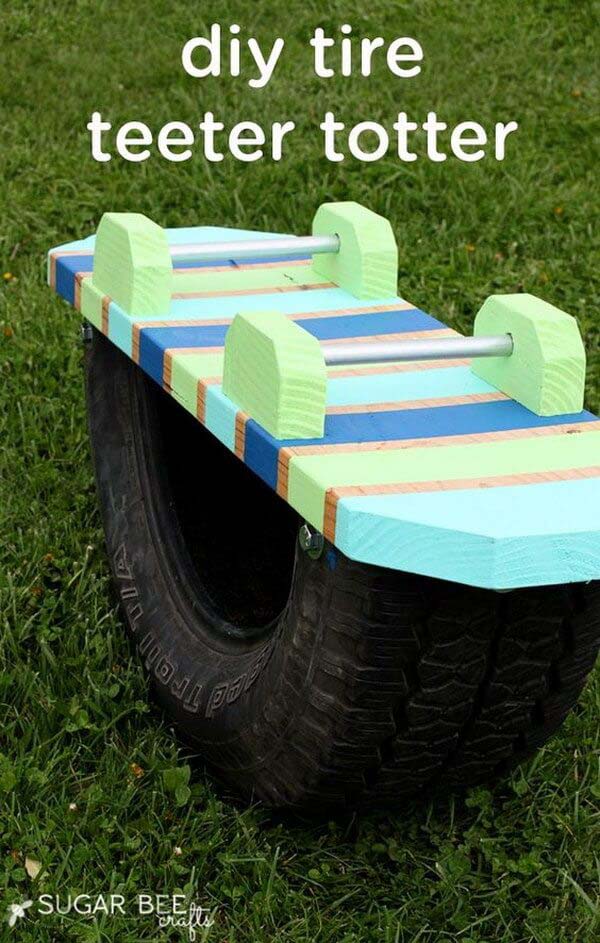 A Colorful Teeter Totter for Little Ones #backyardkidsgames #diybackyardgames #decorhomeideas