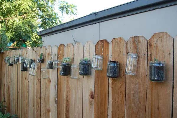 Glass Jars #fenceplanters #fenceflowerpots #decorhomeideas