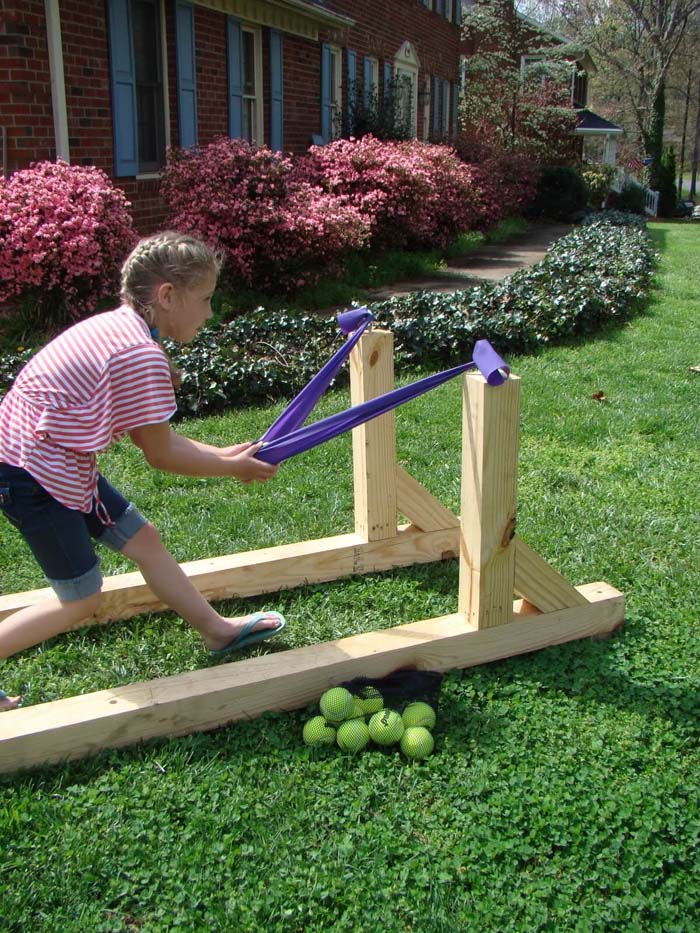 Oversized Slingshot Fun Destruction Game #diybackyardgames #outdoorgames #decorhomeideas