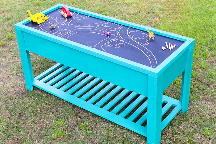 Pastel Table with Sand and Water Stations #backyardkidsgames #diybackyardgames #decorhomeideas