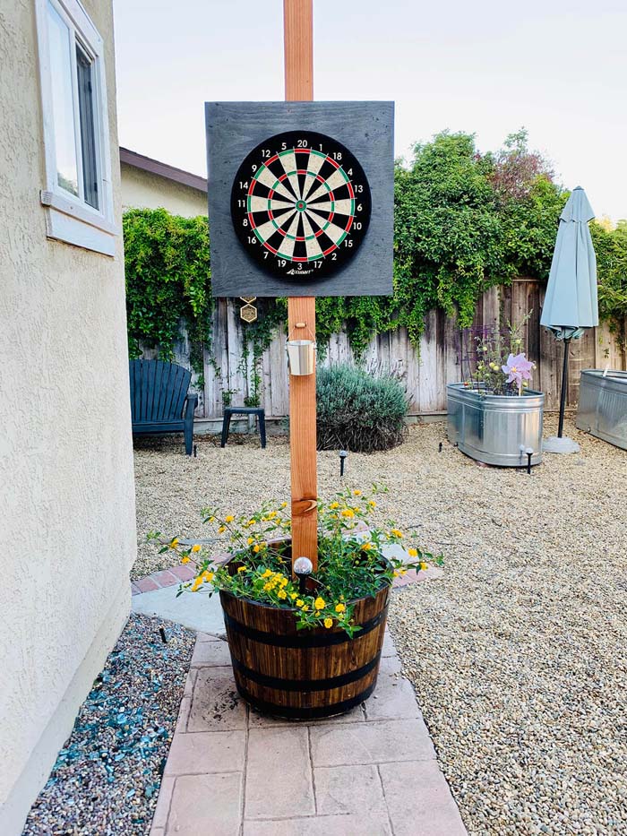 Rolling Potted Plant Dartboard Stand #diybackyardgames #outdoorgames #decorhomeideas