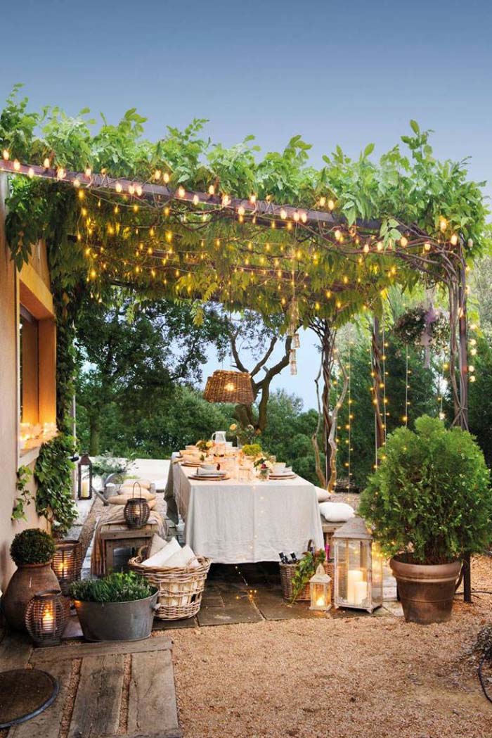 Rustic Pergola with Twinkling Lights #rusticpatioideas #rusticpatio #decorhomeideas