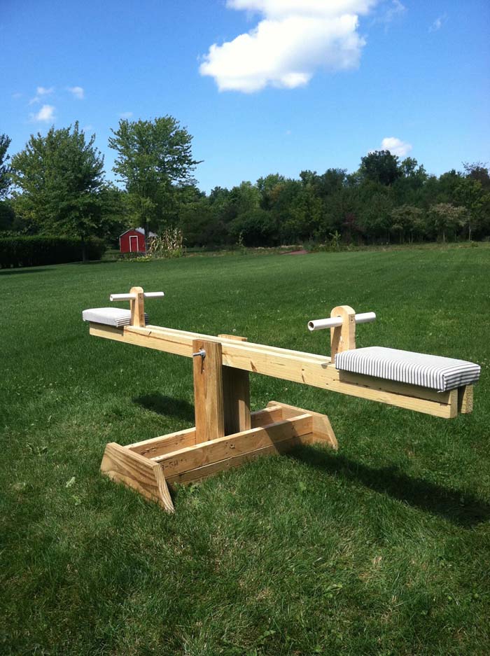 A See-Saw with Extra Cushioning #backyardkidsgames #diybackyardgames #decorhomeideas