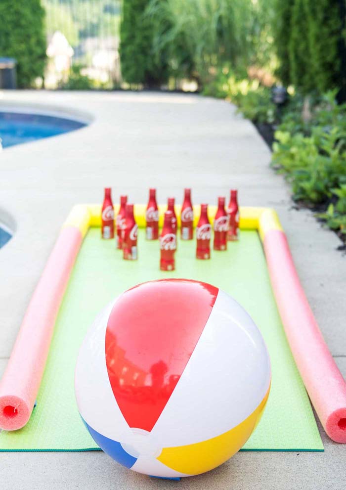 Soda Bottle and Beach Ball Bowling #diybackyardgames #outdoorgames #decorhomeideas
