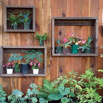 Upcycled Crate Shelves for Container Gardening #fenceplanters #fenceflowerpots #decorhomeideas