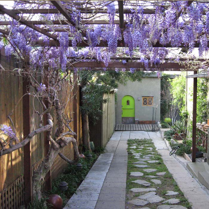 A Ceiling of Hanging Flowers #sideyard #sidegarden #decorhomeideas