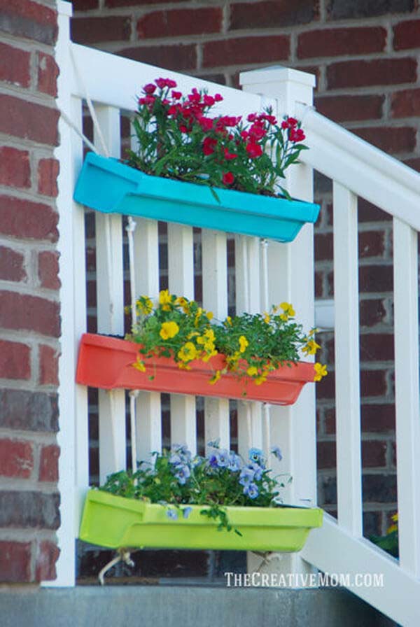 Colorful Gutter Garden Planters #gardenplanter #diygardenplanter #decorhomeideas