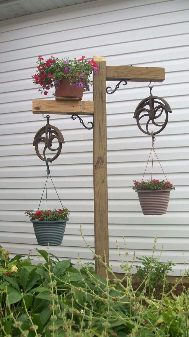 Old Wheels used as Plant Hangers #repurposedplanter #repurposedcontainer #decorhomeideas