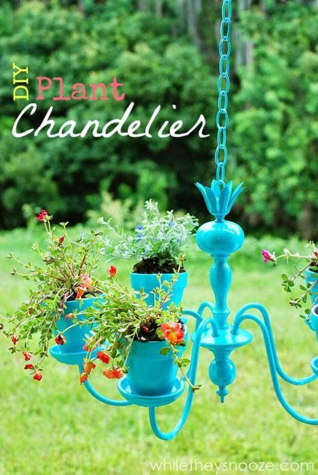 Painted Hanging Plant Chandelier with Flowers #repurposedplanter #repurposedcontainer #decorhomeideas