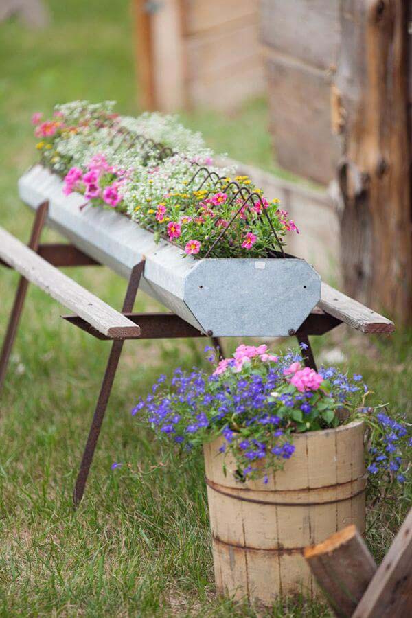 Repurposed Garden Container Ideas with Blossoms #repurposedplanter #repurposedcontainer #decorhomeideas