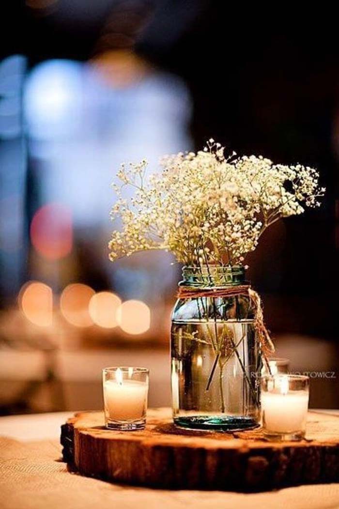 Baby's Breath Bouquet Illuminated by Candles #flowerarrangementsideas #flowerarrangement #decorhomeideas