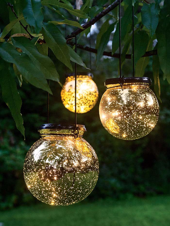 Battery Powered Fairy Lights in Glass Lanterns #backyardlightingideas #decorhomeideas